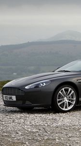 Preview wallpaper aston martin, db9, 2010, black, side view, style, cars, sports, nature, mountains