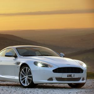 Preview wallpaper aston martin, db9, 2010, white, side view, style, sports, cars, nature, sunset