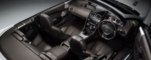 Preview wallpaper aston martin, db9, 2010, black, salon, interior, steering wheel, speedometer