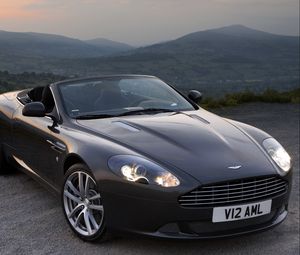 Preview wallpaper aston martin, db9, 2010, black, front view, style, cars, mountains