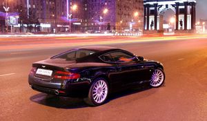 Preview wallpaper aston martin, db9, black, side view, style, cars, city, buildings, lights, asphalt