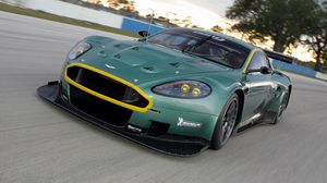 Preview wallpaper aston martin, dbr9, 2005, green, front view, style, cars, sports, speed, trees