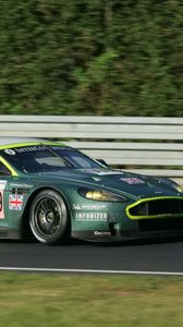 Preview wallpaper aston martin, dbr9, 2005, green, side view, style, sports, car, racing car, speed, trees, grass