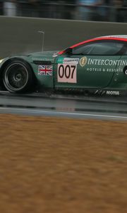 Preview wallpaper aston martin, dbr9, 2005, green, side view, style, sports, cars, speed, wet asphalt