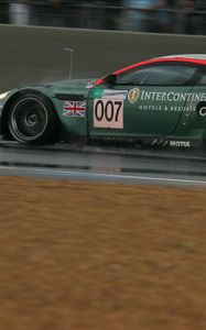 Preview wallpaper aston martin, dbr9, 2005, green, side view, style, sports, cars, speed, wet asphalt