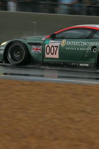 Preview wallpaper aston martin, dbr9, 2005, green, side view, style, sports, cars, speed, wet asphalt