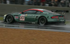 Preview wallpaper aston martin, dbr9, 2005, green, side view, style, sports, cars, speed, wet asphalt