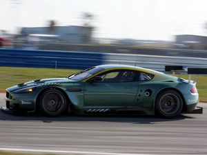 Preview wallpaper aston martin, dbr9, 2005, green, side view, style, sports, cars, speed, asphalt