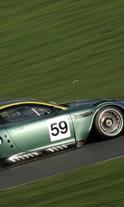 Preview wallpaper aston martin, dbr9, 2005, green, side view, style, sports, cars, speed, grass