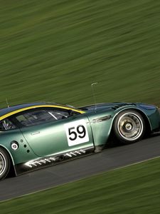 Preview wallpaper aston martin, dbr9, 2005, green, side view, style, sports, cars, speed, grass