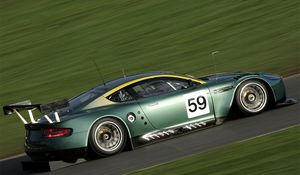 Preview wallpaper aston martin, dbr9, 2005, green, side view, style, sports, cars, speed, grass