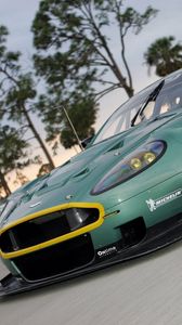 Preview wallpaper aston martin, dbr9, 2005, green, front view, style, cars, sports, nature, trees, asphalt