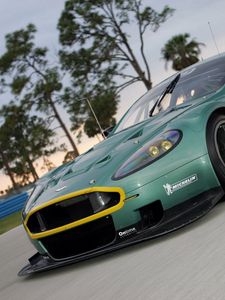 Preview wallpaper aston martin, dbr9, 2005, green, front view, style, cars, sports, nature, trees, asphalt