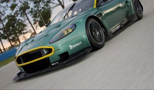 Preview wallpaper aston martin, dbr9, 2005, green, front view, style, cars, sports, nature, trees, asphalt