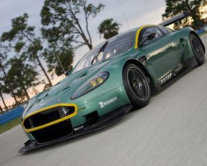 Preview wallpaper aston martin, dbr9, 2005, green, front view, style, cars, sports, nature, trees, asphalt