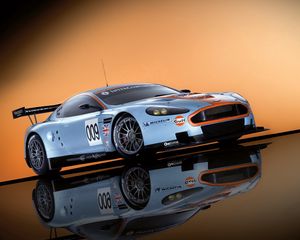 Preview wallpaper aston martin, dbr9, 2008, white, side view, style, sports, cars, reflection