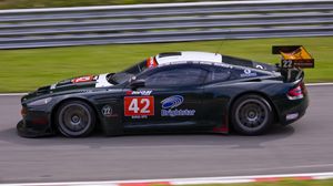 Preview wallpaper aston martin, dbrs9, 2005, black, side view, style, sports, car, racing car, speed, grass