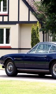 Preview wallpaper aston martin, dbs, 1967, blue, side view, style, retro, house, trees