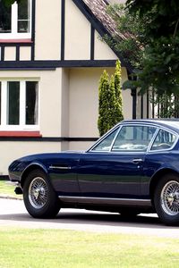 Preview wallpaper aston martin, dbs, 1967, blue, side view, style, retro, house, trees