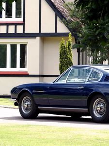 Preview wallpaper aston martin, dbs, 1967, blue, side view, style, retro, house, trees