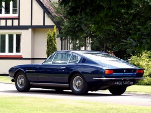 Preview wallpaper aston martin, dbs, 1967, blue, side view, style, retro, house, trees