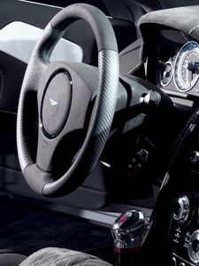 Preview wallpaper aston martin, dbs, 2006, black, salon, interior, steering wheel, speedometer