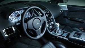 Preview wallpaper aston martin, dbs, 2008, black, salon, interior, steering wheel, speedometer