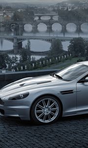 Preview wallpaper aston martin, dbs, 2008, gray metallic, side view, city, bridge, nature