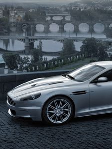 Preview wallpaper aston martin, dbs, 2008, gray metallic, side view, city, bridge, nature