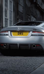 Preview wallpaper aston martin, dbs, 2008, gray metallic, rear view, style, cars, street, building