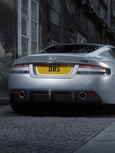 Preview wallpaper aston martin, dbs, 2008, gray metallic, rear view, style, cars, street, building