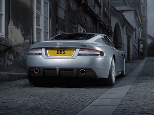 Preview wallpaper aston martin, dbs, 2008, gray metallic, rear view, style, cars, street, building