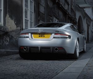 Preview wallpaper aston martin, dbs, 2008, gray metallic, rear view, style, cars, street, building