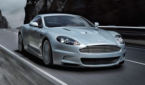 Preview wallpaper aston martin, dbs, 2008, gray metallic, front view, sports, cars, rocks, speed