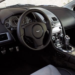 Preview wallpaper aston martin, dbs, 2008, black, salon, interior, steering wheel, speedometer