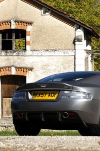 Preview wallpaper aston martin, dbs, 2008, gray, rear view, car, house, trees