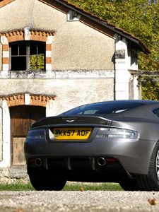 Preview wallpaper aston martin, dbs, 2008, gray, rear view, car, house, trees