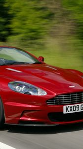 Preview wallpaper aston martin, dbs, 2009, red, side view, speed, trees, cars
