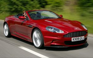 Preview wallpaper aston martin, dbs, 2009, red, side view, speed, trees, cars