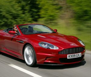 Preview wallpaper aston martin, dbs, 2009, red, side view, speed, trees, cars