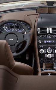 Preview wallpaper aston martin, dbs, 2009, brown, interior, salon, steering wheel, speedometer, style