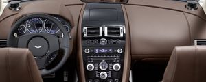 Preview wallpaper aston martin, dbs, 2009, brown, interior, salon, steering wheel, speedometer, style