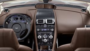 Preview wallpaper aston martin, dbs, 2009, brown, interior, salon, steering wheel, speedometer, style