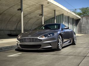 Preview wallpaper aston martin, dbs, 2009, gray, front view, cars, sky