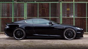 Preview wallpaper aston martin, dbs, 2009, black, side view, cars, building