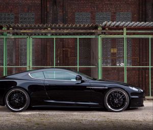 Preview wallpaper aston martin, dbs, 2009, black, side view, cars, building