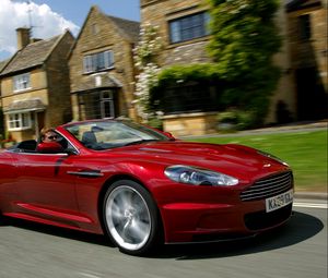 Preview wallpaper aston martin, dbs, 2009, red, side view, cars, houses, grass