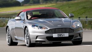 Preview wallpaper aston martin, dbs, 2009, gray metallic, front view, cars, nature