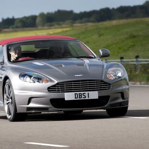 Preview wallpaper aston martin, dbs, 2009, gray metallic, front view, cars, nature