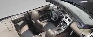 Preview wallpaper aston martin, dbs, 2010, gray, salon, interior, top view, steering wheel, speedometer